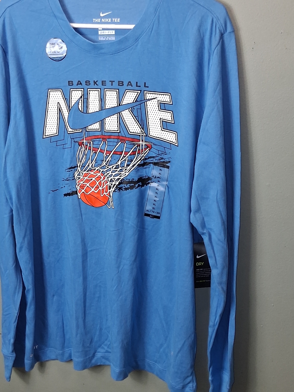 Nike Blue Long Sleeve Basketball Graphic Tee with Orange Hoop